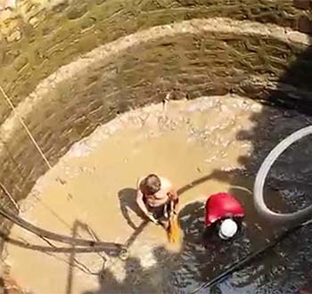 sludge removing from well